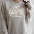 I Put My Book Down To Be Here Reader Raglan Sleeve Sweatshirt Heather Forest