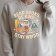 Read Books Be Kind Stay Weird Book Dragon Skeleton Reading Raglan Sleeve Sweatshirt Heather Forest