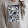 Read In Peace Book Lover Bookworm Skeleton Book Lover Raglan Sleeve Sweatshirt Heather Forest
