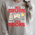 Say No To Drugs Say Yes To Books Red Ribbon Week Awareness Raglan Sleeve Sweatshirt Heather Forest