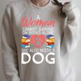 A Woman Cannot Survive On Books Alone She Also Needs a Dog Raglan Sleeve Sweatshirt Heather Forest