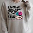 A Woman Cannot Survive On Books Alone She Also Needs Yarn Raglan Sleeve Sweatshirt Heather Forest A Woman Cannot Survive On Books Alone She Also Needs Yarn Raglan Sleeve Sweatshirt Heather Forest