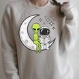 Women's Alien And Astronaut Reading On Moon Kids Sci Fi Book Raglan Sleeve Sweatshirt Heather Forest