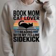 Women's Book Mom Cat Lover Reading With My Felline Sidekick Raglan Sleeve Sweatshirt Heather Forest