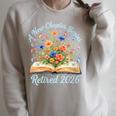Women's New Chapter Begins Retired 2026 Watercolor Floral Book Women Raglan Sleeve Sweatshirt Heather Forest