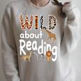 Zoo Animals Wild About Reading Books Reader Lover Librarian Premium Tri-Blend Raglan Sleeve Sweatshirt Heather Forest