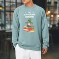 The Bookworm Gnome Christmas Gnome Book Reading Enthusiast Raglan Sleeve Sweatshirt Cardinal