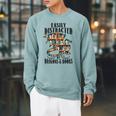 EASILY DISTRACTED BY DRAGONS & BOOKS Medieval Fantasy Reader Raglan Sleeve Sweatshirt Cardinal