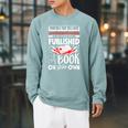 Never Underestimate Published Author Novelist Book Author Raglan Sleeve Sweatshirt Cardinal