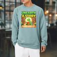 Unearth A Story Dinosaur Summer Reading 2026 Books Raglan Sleeve Sweatshirt Cardinal