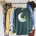 Astronaut And Alien Reading On Moon Space Book Lover Sci Fi Raglan Sleeve Sweatshirt Heather Blue Lagoon