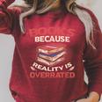 Books Because Reality Is Overrated Raglan Sleeve Sweatshirt Heather Dust