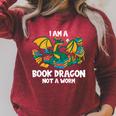 Bookworm Books Reading I Am A Book Dragon Raglan Sleeve Sweatshirt Heather Dust