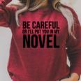Be Careful Or I'Ll Put You In My Novel Book Author Raglan Sleeve Sweatshirt Heather Dust