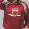 Cute Otter Wearing Glasses Reading Book Librarian Teacher Raglan Sleeve Sweatshirt Heather Dust Cute Otter Wearing Glasses Reading Book Librarian Teacher Raglan Sleeve Sweatshirt Heather Dust