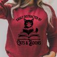 Easily Distracted By Cats And Books Book And Cat Lover Premium Tri-Blend Raglan Sleeve Sweatshirt Heather Dust Easily Distracted By Cats And Books Book And Cat Lover Premium Tri-Blend Raglan Sleeve Sweatshirt Heather Dust