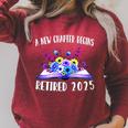 A New Chapter Begins Retired 2025 Floral Book Retirement Raglan Sleeve Sweatshirt Heather Dust