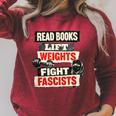 Read Books Lift Weights Fight Fascists Activist Raglan Sleeve Sweatshirt Heather Dust