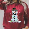Snowman Book Stack Librarian Book Lover Christmas Raglan Sleeve Sweatshirt Heather Dust