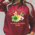 Unearth a Story Summer Reading 2026 Dinosaur Book Kids Raglan Sleeve Sweatshirt Heather Dust Unearth a Story Summer Reading 2026 Dinosaur Book Kids Raglan Sleeve Sweatshirt Heather Dust