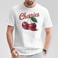 レトロなさくらんぼのイラスト 大胆な赤い果実 ヴィンテージ付き Tシャツ 面白い贈り物