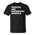Morons Are Governing America Tシャツ