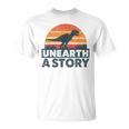 Unearth A Story Dinosaur Reader Book Lover 2026 T-Shirt