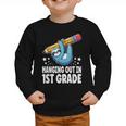 Back To School First Grade Sloth Hanging Out In 1st Grade Graphic Toddler Sweatshirt