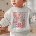 In My Middle School Era Cute Groovy First Day Back To School Graphic Toddler Sweatshirt In My Middle School Era Cute Groovy First Day Back To School Graphic Toddler Sweatshirt