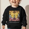 Dyslexia Interventionist Groovy Coquette Bow Back To School Graphic Toddler Sweatshirt