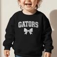 Gators High School Coquette Bow Gator Back To School Graphic Toddler Sweatshirt Gators High School Coquette Bow Gator Back To School Graphic Toddler Sweatshirt