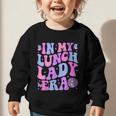 Groovy In My Lunch Lady Era Cafeteria Back To School Graphic Toddler Sweatshirt Groovy In My Lunch Lady Era Cafeteria Back To School Graphic Toddler Sweatshirt