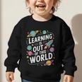 Learning Is Out Of This World Back To School Graphic Toddler Sweatshirt Learning Is Out Of This World Back To School Graphic Toddler Sweatshirt