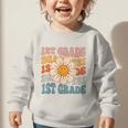 Retro 1st Grade Daisy Colorful Back To School First Grade Graphic Toddler Sweatshirt