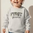 Retro First Grade Old Camo Back To School Boy Girl 1st Grade Graphic Toddler Sweatshirt