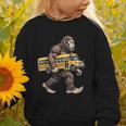 Bigfoot Carrying School Bus Sasquatch Back To School Graphic Toddler Sweatshirt