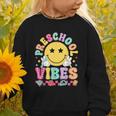 Preschool Vibes Smile Face Back To School Kinder Girls Kids Graphic Toddler Sweatshirt Preschool Vibes Smile Face Back To School Kinder Girls Kids Graphic Toddler Sweatshirt