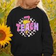 Retro Checkered Teach Pencil Lightning Back To School Graphic Toddler Sweatshirt Retro Checkered Teach Pencil Lightning Back To School Graphic Toddler Sweatshirt