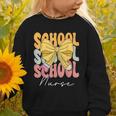 School Nurse Groovy Coquette Bow Cute Back To School Graphic Toddler Sweatshirt