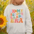 In My Second Grade Era Back To School Retro Groovy 2nd Grade Graphic Toddler Sweatshirt In My Second Grade Era Back To School Retro Groovy 2nd Grade Graphic Toddler Sweatshirt