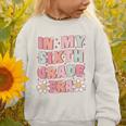 In My Sixth Grade Era Cute Groovy 6th Grade Back To School Graphic Toddler Sweatshirt In My Sixth Grade Era Cute Groovy 6th Grade Back To School Graphic Toddler Sweatshirt