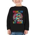 First Day Back To School 1st Grade Boys Football Dinosaur Graphic Toddler Long Sleeve Tee First Day Back To School 1st Grade Boys Football Dinosaur Graphic Toddler Long Sleeve Tee