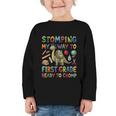 First Grade Graduation Dinosaur Dino Back To School Student Graphic Toddler Long Sleeve Tee First Grade Graduation Dinosaur Dino Back To School Student Graphic Toddler Long Sleeve Tee