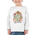 Groovy First Grade Wildflowers Back To School 1st Grade Graphic Toddler Long Sleeve Tee