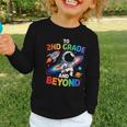 2nd Grade And Beyond Second Grade Astronaut Back To School Graphic Toddler Long Sleeve Tee