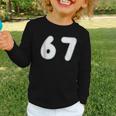 Back To School 67 Notebook Number For Class Year Graphic Toddler Long Sleeve Tee Back To School 67 Notebook Number For Class Year Graphic Toddler Long Sleeve Tee