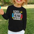 First Day Of 6th Grade Level Unlocked Game Back To School Graphic Toddler Long Sleeve Tee