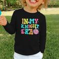 In My Knights Era Back To School Spirit Game Retro Groovy Graphic Toddler Long Sleeve Tee In My Knights Era Back To School Spirit Game Retro Groovy Graphic Toddler Long Sleeve Tee