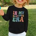 In My Mustangs Era Back To School Spirit Game Retro Groovy Graphic Toddler Long Sleeve Tee In My Mustangs Era Back To School Spirit Game Retro Groovy Graphic Toddler Long Sleeve Tee