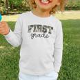 Retro First Grade Old Camo Back To School Boy Girl 1st Grade Graphic Toddler Long Sleeve Tee Retro First Grade Old Camo Back To School Boy Girl 1st Grade Graphic Toddler Long Sleeve Tee